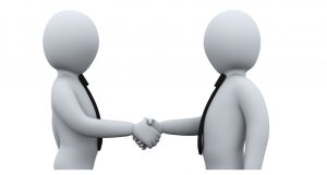 21023021 - 3d illustration of businessman shaking hands with his business partner  3d rendering of human businessman character